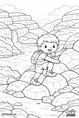 A smiling boy climbs over large rocks in a canyon with layered cliffs, a river, and a waterfall behind him.