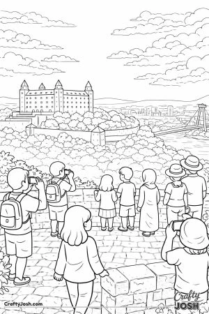 A castle sits on a hill overlooking a river and city while people stand at a viewpoint taking photos and enjoying the wide view