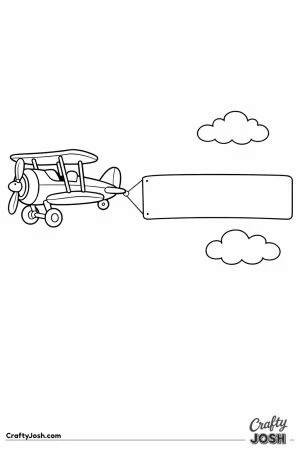 Biplane towing a long blank banner across the sky