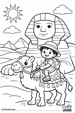 Boy on camel in front of sphinx