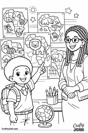 Boy pointing at africa map display classroom
