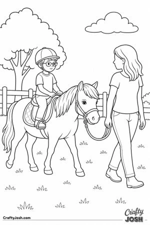 Boy on a pony being led on a lead rope