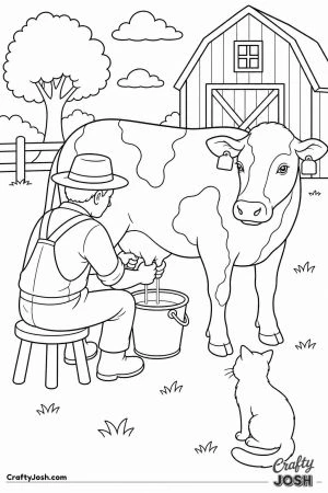 Farmer milking a cow by hand