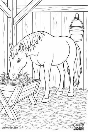 Horse eating from a manger in a straw stable