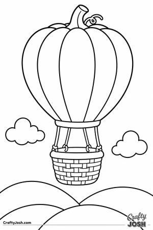 Pumpkin hot air balloon floating over hills