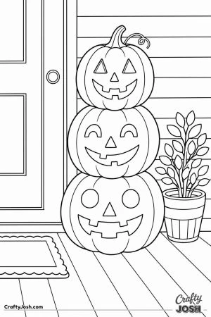 Stack of three jack o lanterns on a front porch